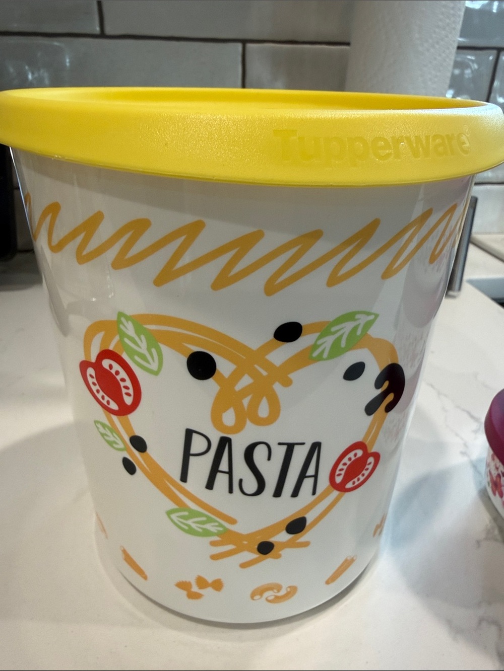 Tupperware White Pasta Canister with Yellow Lid and Multicolor Graphics
